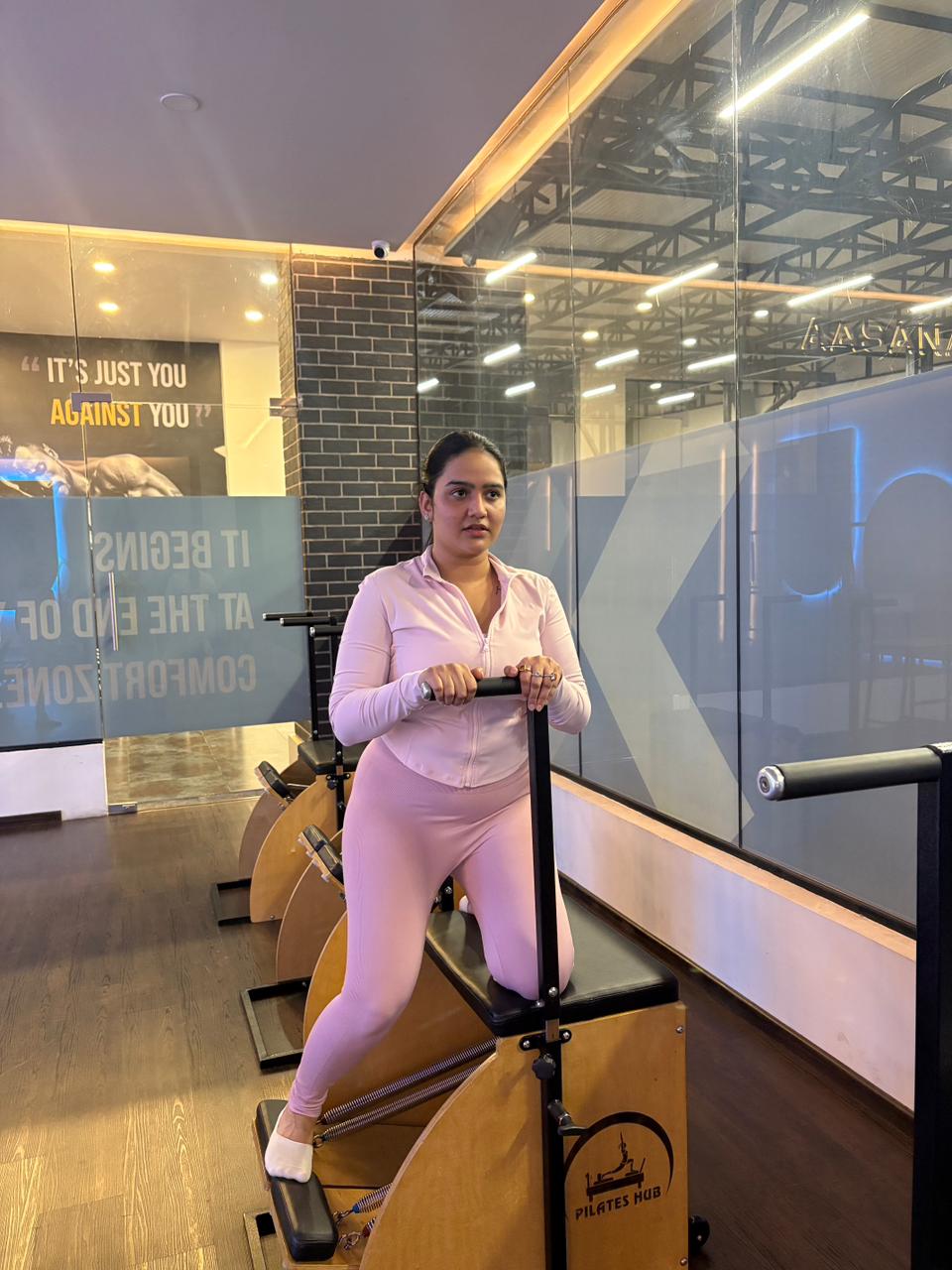 Pilates instructor guiding a session