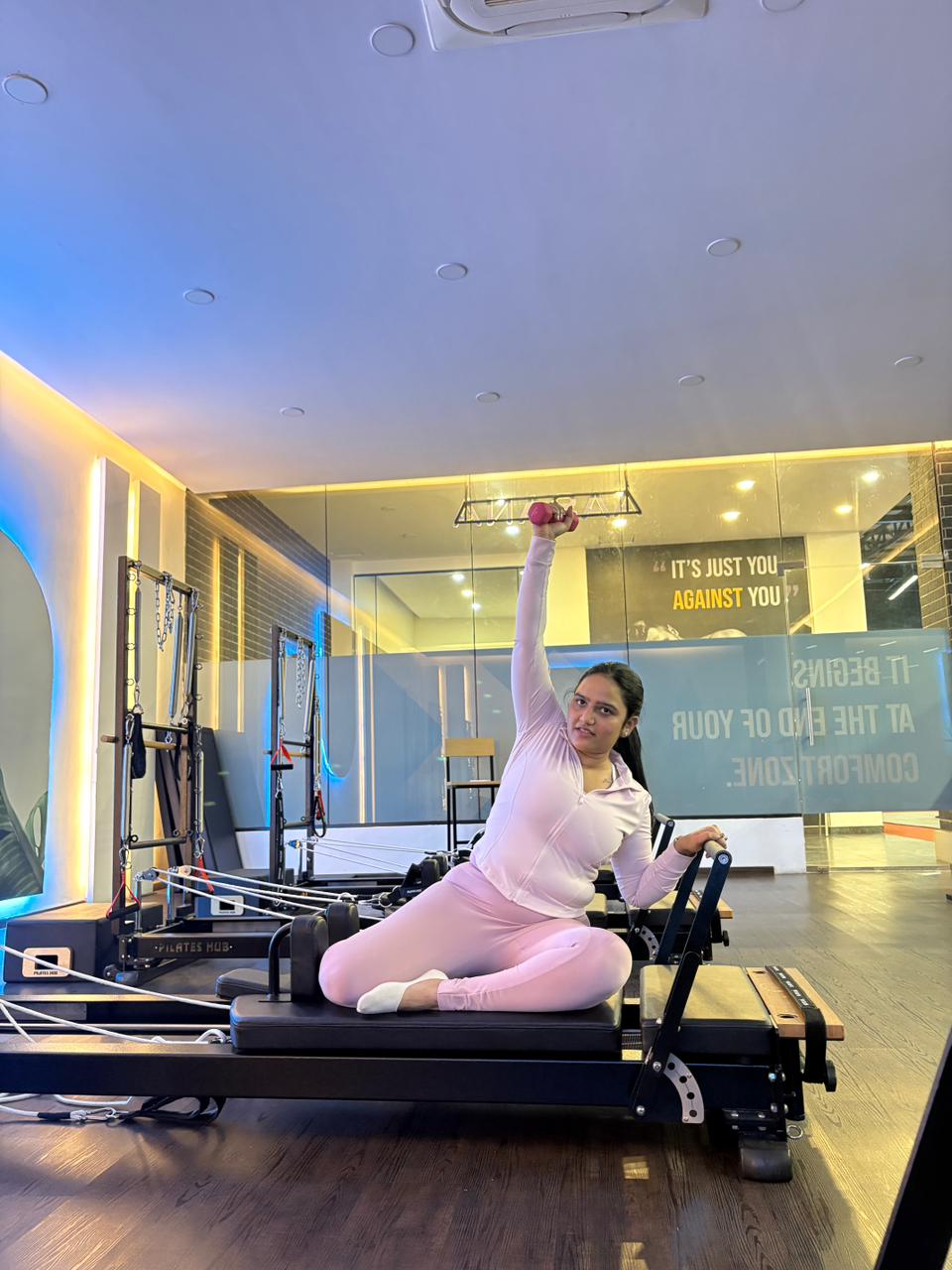 Pilates instructor guiding a session